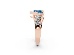 Fancy Blue Heart Cut Diamond Bezel Bypass Ring Set in Rose gold with Round Accents