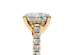 Radiant Cut Diamond Solitaire Ring Set in Yellow gold with Brilliant Pavé Band and Prong Setting