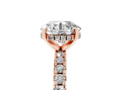 Round Cut Diamond Pavé Solitaire Ring Set in Rose gold with Round Band Accents and Prong Setting