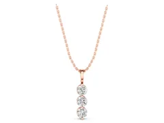 Three-Stone Round Diamond Drop Pendant Set in Rose gold with Four-Prong Setting