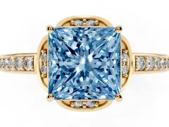 Fancy Blue Princess Cut Diamond Halo Ring Set in Yellow gold with Channel Set Band and Prong Setting