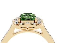 Fancy Green Emerald Cut Diamond Halo Ring Set in Yellow gold with Pavé-Lined Shoulders and Prong Setting