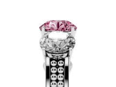 Fancy Pink Round Cut Diamond Three-Stone Ring Set in Platinum with Textured Band