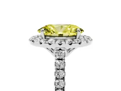 Fancy Yellow Oval Cut Diamond Pavé Halo Engagement Ring Set in Platinum with Pavé Band and Prong Setting