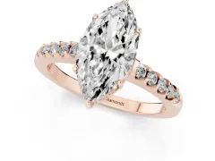 Marquise Cut Diamond Solitaire Engagement Ring Set in Rose gold with Pavé Band and Prong Setting