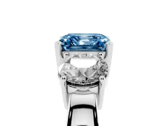 Fancy Blue Asscher Cut Diamond Three-Stone Ring Set in White gold with Round Side Stones and Classic Band
