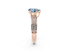 Fancy Blue Pear Cut Diamond Solitaire Ring Set in Rose gold with Multi-Row Round Pavé Band and Prong Setting