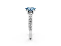 Fancy Blue Oval Cut Diamond Solitaire Ring Set in Silver with Milgrain-Edged Pavé Band and Prong Setting