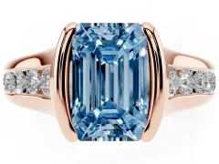 Fancy Blue Emerald Cut Diamond Bezel-Set Solitaire Ring Set in Rose gold with Channel-Set Band