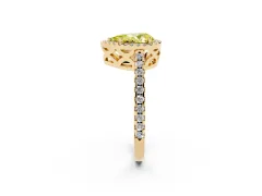 Fancy Yellow Pear Cut Diamond Halo Ring Set in Yellow gold with Pavé Shoulders and Halo-Framed Center