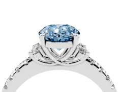 Fancy Blue Oval Cut Diamond Three-Stone Pavé Ring Set in Silver with Prong Setting