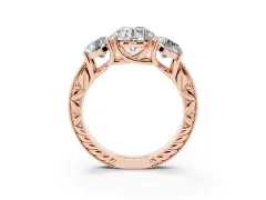 Round Cut Diamond Three-Stone Engagement Ring Set in Rose gold with Milgrain Pavé Band