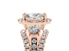 Oval Cut Diamond Halo Split Shank Ring Set in Rose gold with Round Accent Stones and Prong Setting