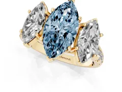 Fancy Blue Marquise Cut Diamond Three-Stone Ring Set in Yellow gold with Pavé Band