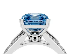 Fancy Blue Asscher Cut Diamond Split Shank Pavé Engagement Ring Set in White gold with Prong-Set Center Stone