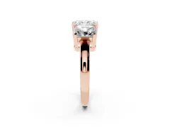 Radiant Cut Diamond Three-Stone Ring Set in Rose gold with Channel-Set Band and Prong Settings