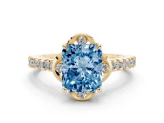 Fancy Blue Radiant Cut Diamond Solitaire Ring Set in Yellow gold with Pavé Band and Floral Prong Setting