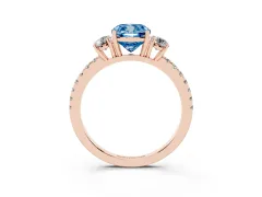 Fancy Blue Cushion Cut Diamond Three-Stone Ring Set in Rose gold with Pavé Band and Graduated Sides