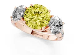 Fancy Yellow Round Cut Diamond Three-Stone Ring Set in Rose gold with Pavé Band