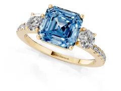 Fancy Blue Asscher Cut Diamond Three-Stone Ring Set in Yellow gold with Pavé Band and Graduated Sides