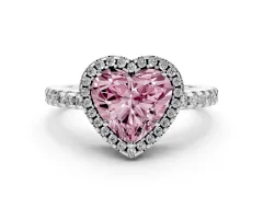 Fancy Pink Heart Cut Diamond Halo Ring Set in White gold with Pavé Shoulders and Halo-Framed Center