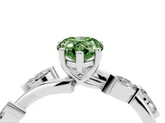 Fancy Green Pear Cut Diamond Solitaire Ring Set in Platinum with Twisted Marquise Accent Band