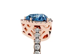 Fancy Blue Heart Cut Diamond Halo Ring Set in Rose gold with Pavé Shoulders and Halo-Framed Center