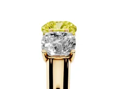 Fancy Yellow Cushion Cut Diamond Three-Stone Ring Set in Yellow gold with Plain Polished Band