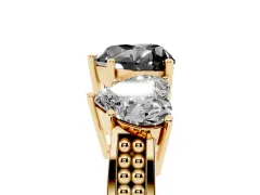 Fancy Black Heart Cut Diamond Three-Stone Ring Set in Yellow gold with Textured Band