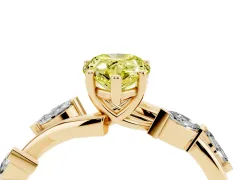 Fancy Yellow Pear Cut Diamond Solitaire Ring Set in Yellow gold with Twisted Marquise Accent Band