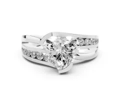 Heart Cut Diamond Solitaire Ring Set in Platinum with Channel Set Split Shank and Tension Prongs
