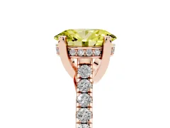 Fancy Yellow Oval Cut Diamond Solitaire Ring Set in Rose gold with Brilliant Pavé Band and Prong Setting