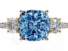 Fancy Blue Cushion Cut Diamond Three-Stone Ring Set in Yellow gold with Pavé Band and Graduated Sides
