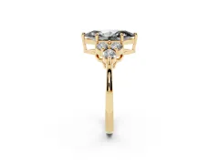 Fancy Black Marquise Cut Diamond Solitaire Ring Set in Yellow gold with Cluster Accents on Each Side