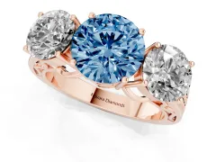 Fancy Blue Round Cut Diamond Three-Stone Ring Set in Rose gold with Textured Band