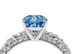 Fancy Blue Cushion Cut Diamond Pavé Band Solitaire Ring Set in White gold with Close-Set Accent Stones and Prong Setting