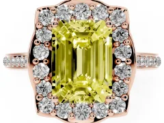 Fancy Yellow Emerald Cut Diamond Halo Ring Set in Rose gold with Pavé-Lined Shoulders and Prong Setting