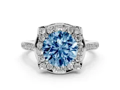 Fancy Blue Round Cut Diamond Halo Ring Set in Platinum with Pavé-Lined Shoulders and Prong Setting