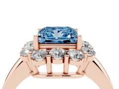 Fancy Blue Princess Cut Diamond Milgrain Halo Solitaire Ring Set in Rose gold with Bezel Set Side Stones and Pavé Band
