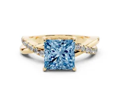 Fancy Blue Princess Cut Diamond Twisted Pavé Band Ring Set in Yellow gold with Prong Setting