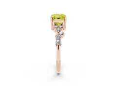 Fancy Yellow Radiant Cut Diamond Ring Set in Rose gold with Scattered Round Accents