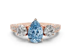Fancy Blue Pear Cut Diamond Three-Stone Ring Set in Rose gold with Round Side Stones and Pavé Band