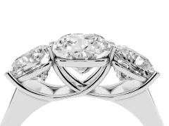 Cushion Cut Diamond Three-Stone Ring Set in Platinum with Plain Polished Band