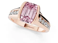 Fancy Pink Emerald Cut Diamond Bezel-Set Solitaire Ring Set in Rose gold with Channel-Set Band