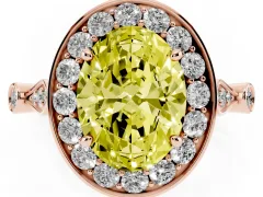 Fancy Yellow Oval Cut Diamond Halo Engagement Ring Set in Rose gold with Twisted Band and Prong Setting