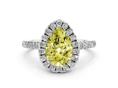Fancy Yellow Pear Cut Diamond Pavé Halo Engagement Ring Set in Platinum with Pavé Band and Prong Setting