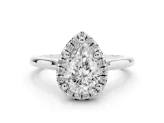 Pear Cut Diamond Halo Engagement Ring Set in Platinum with Pavé Band and Rising Shoulders