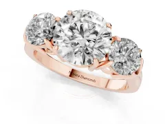 Round Cut Diamond Three-Stone Ring Set in Rose gold with Round Accent Stones and Plain Band