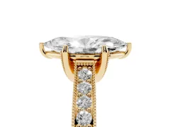 Marquise Cut Diamond Solitaire Ring Set in Yellow gold with Milgrain-Edged Pavé Band and Prong Setting
