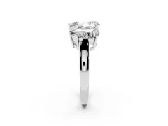 Pear Cut Diamond Three-Stone Ring Set in White gold with Channel-Set Band and Prong Settings